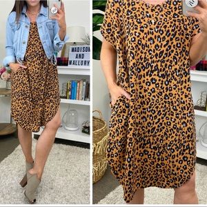 Leopard print dress with pockets scoop bottom